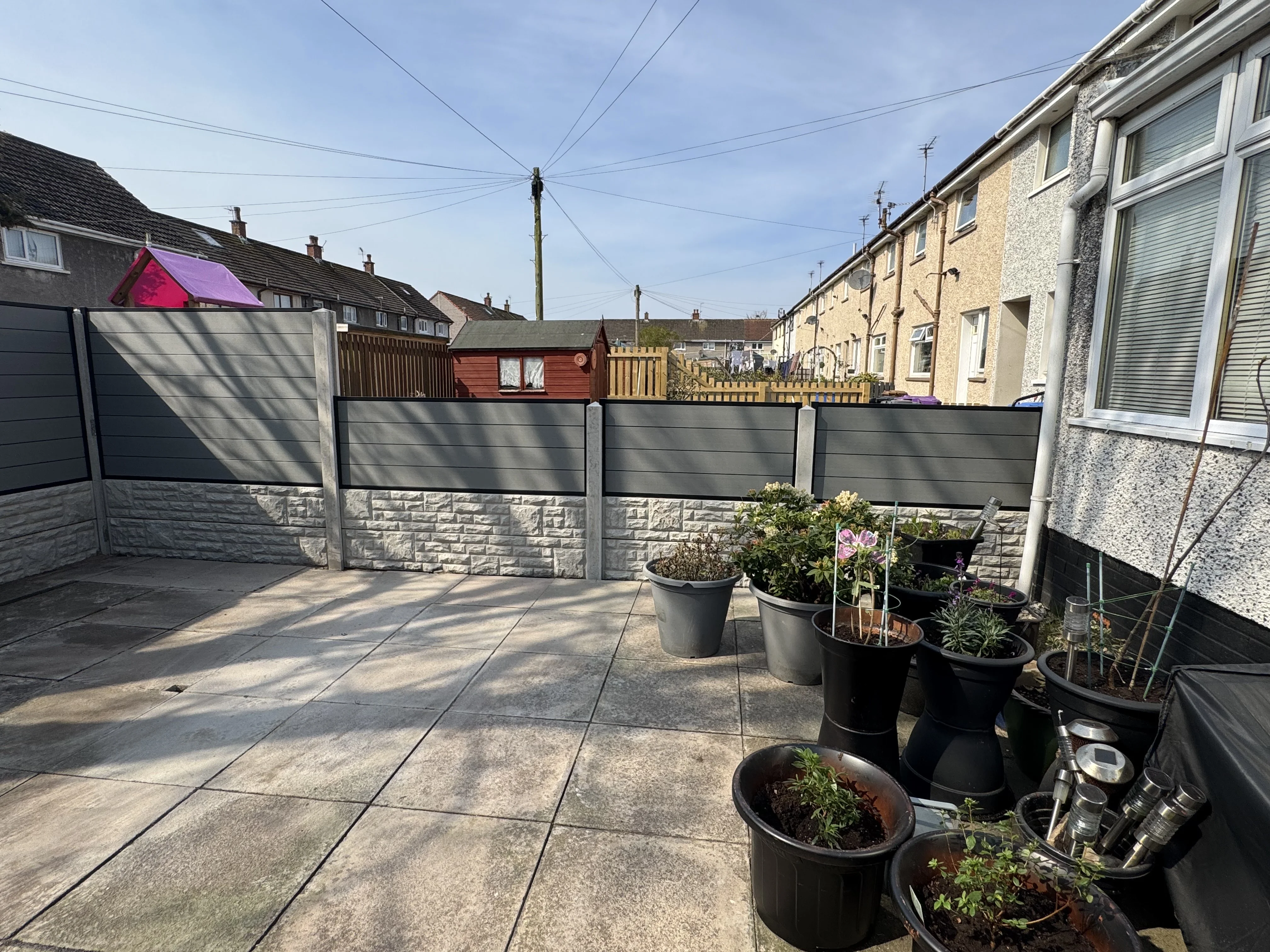 Concrete posts and composite panels with gate project 2 completed in Irvine, Ayrshire