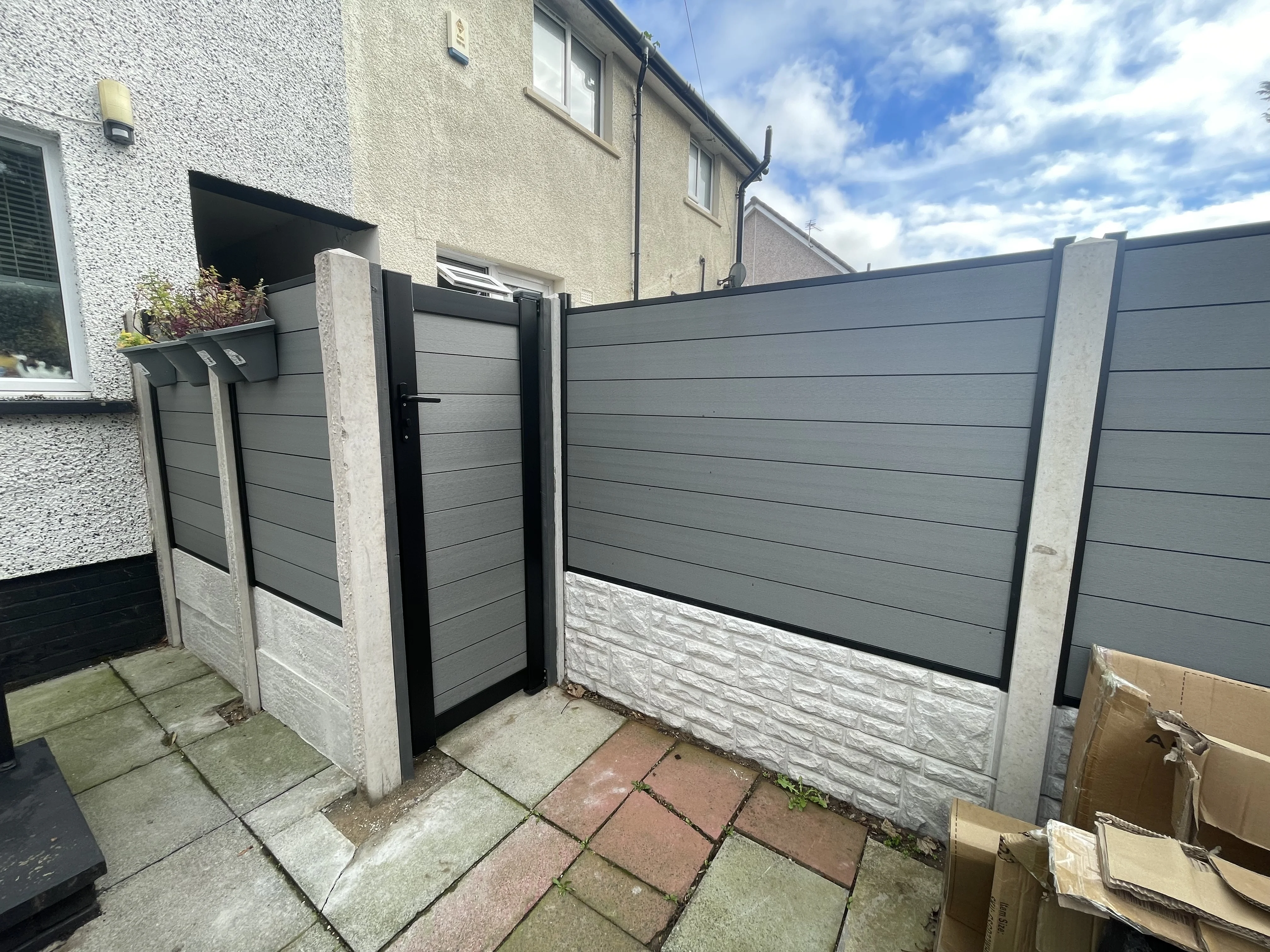 Concrete posts and composite panels with gate installation in the Greater Glasgow area